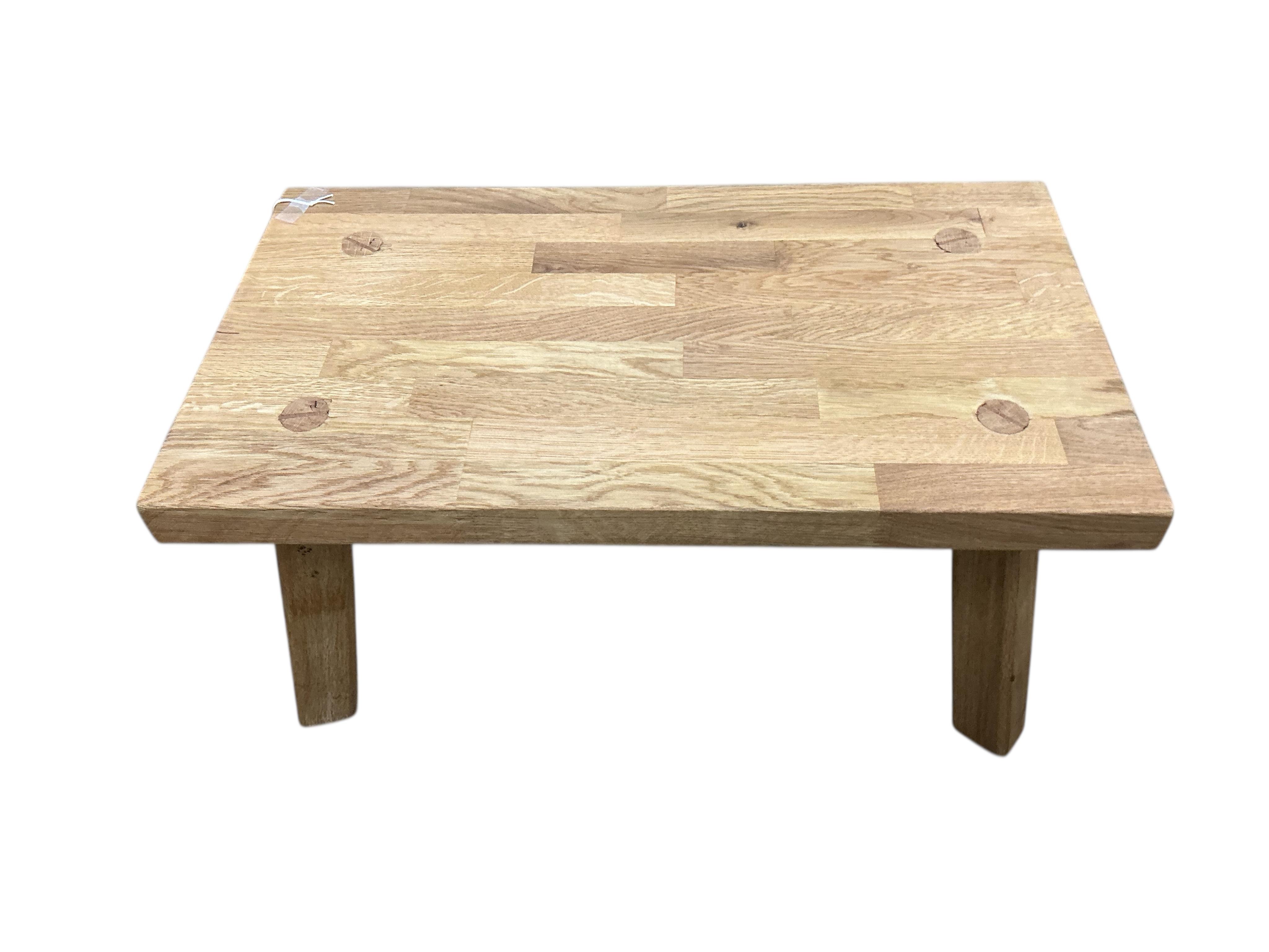A pair of contemporary rectangular oak occasional tables, width 66cm, depth 37cm, height 36cm